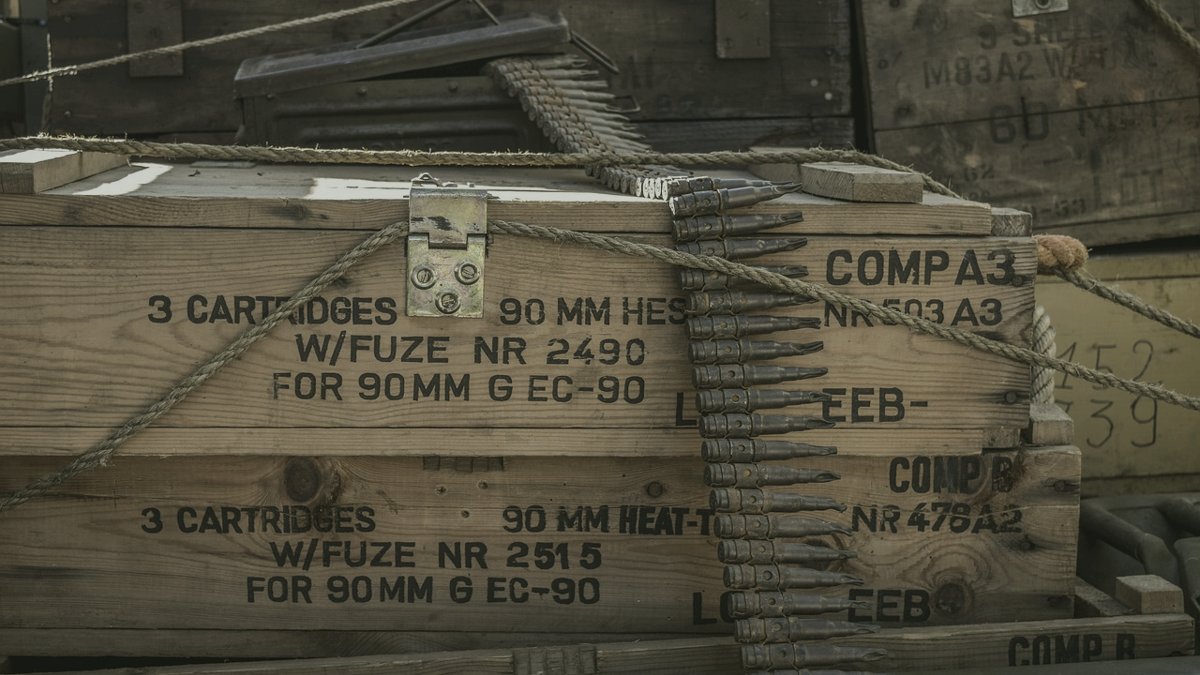 Rows of pistol ammunition standing on a table