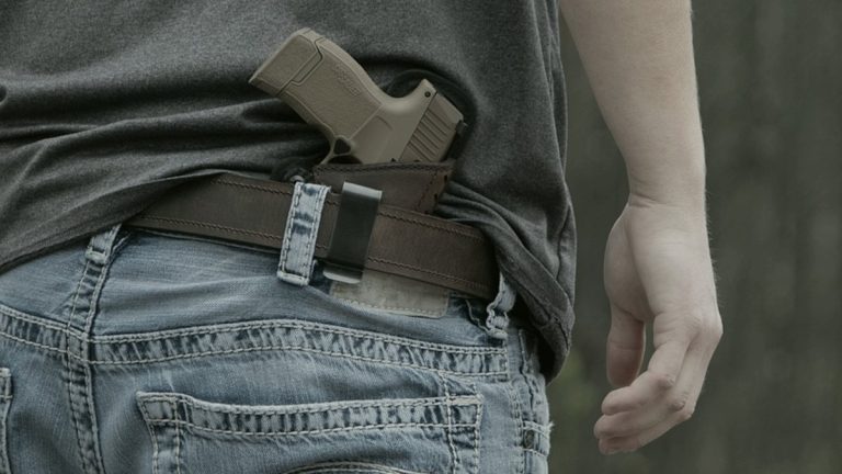 Kydex holster on a leather gun belt