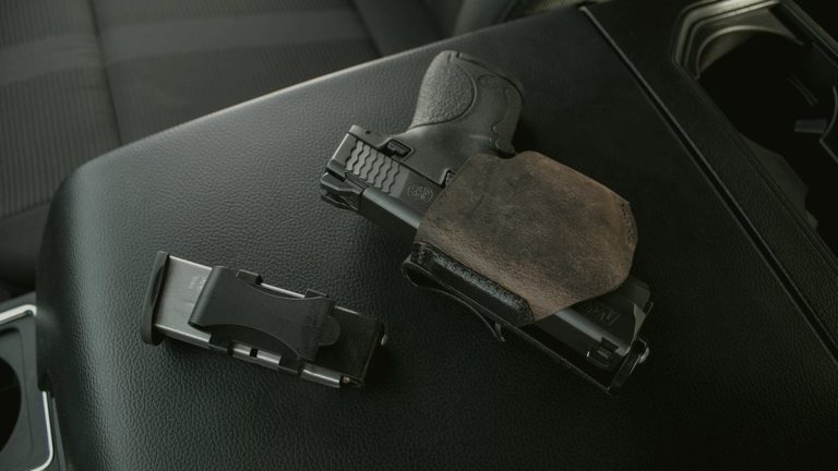 Semi-auto pistol with a slide-mounted red dot optic